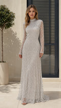 Front view of model wearing silver sequin beaded high neck evening gown