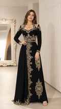 Front view of black embroidered long sleeve kaftan evening gown