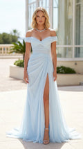 Front view of woman wearing sky blue off-the-shoulder ruched evening gown with high slit