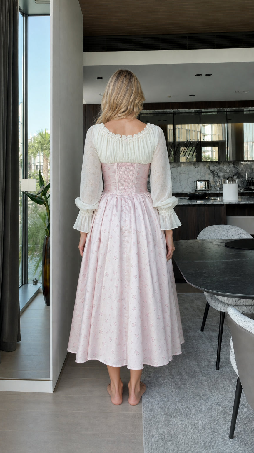 Back view of model wearing pink vintage corset midi dress